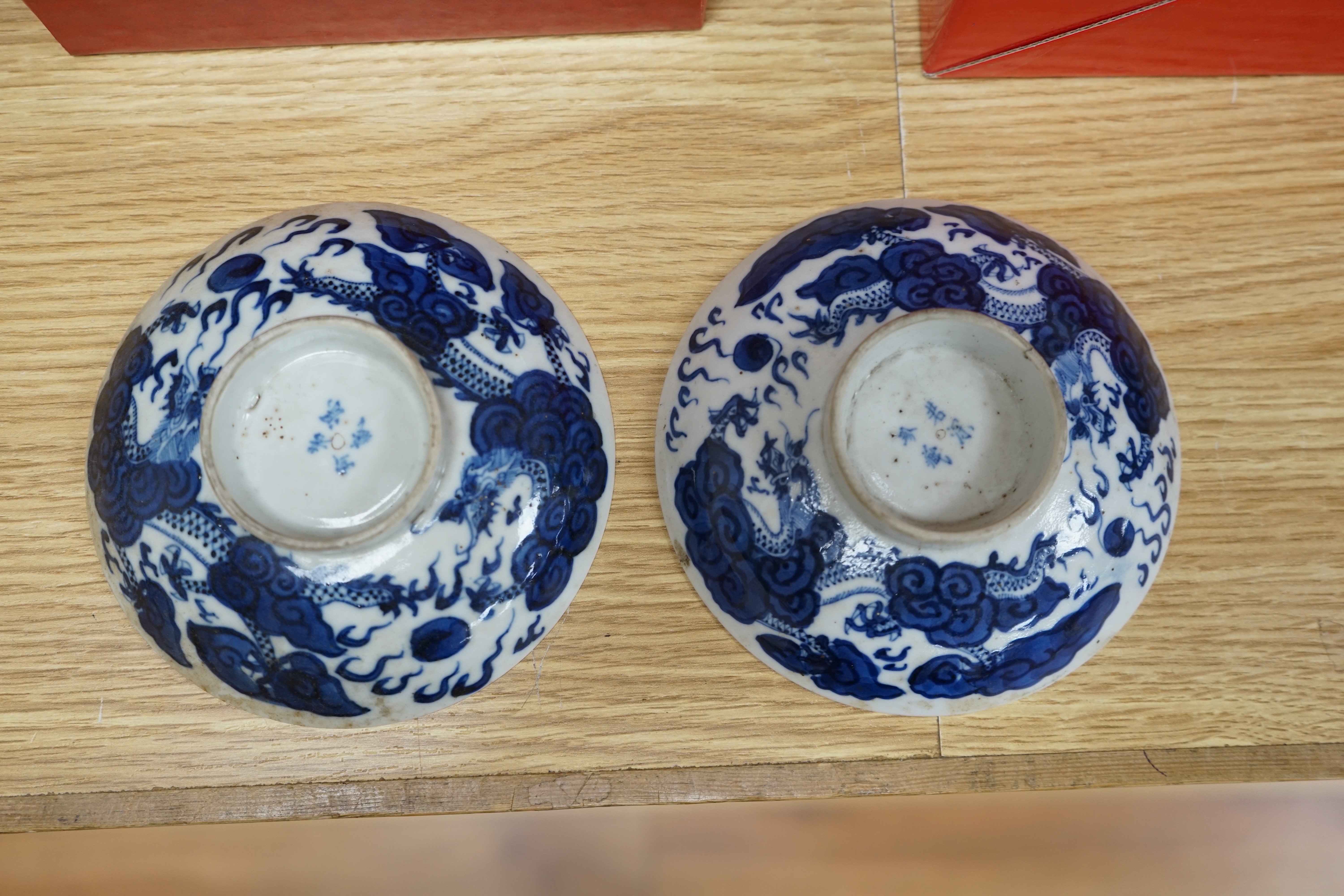 A quantity of Chinese and Japanese porcelain to include blue and white bowls, famille rose tea bowls and a pair of late 19th century dishes (18). Condition - varies, poor to fair